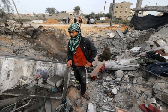 Civilians recover belongings after Rafah bombardment